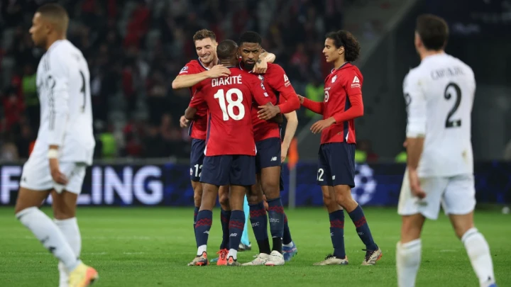 Lille's players celebrate after winning their Champions League match against Real Madrid at the Pierre Mauroy Stadium in Villeneuve-d'Ascq on October 2, 2024. Photo: AFP