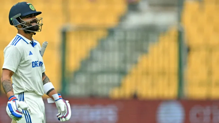 India's Virat Kohli walks back to the pavilion after his dismissal for 0 during the second day of the first Test match against New Zealand at the M Chinnaswamy Stadium in Bengaluru, October 17, 2024 [Idrees Mohammed/AFP]