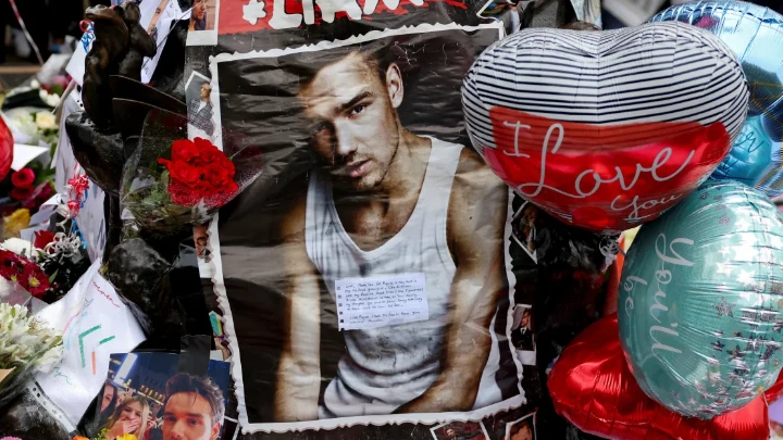 Tributes placed at a memorial for former One Direction singer Liam Payne at London's Hyde Park on Sunday. Hollie Adams/Reuters