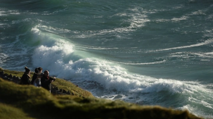 People look out to the Atlantic ocean from Slea Had in Ventry, Ireland December 27, 2016. REUTERS/Clodagh Kilcoyne/File Photo