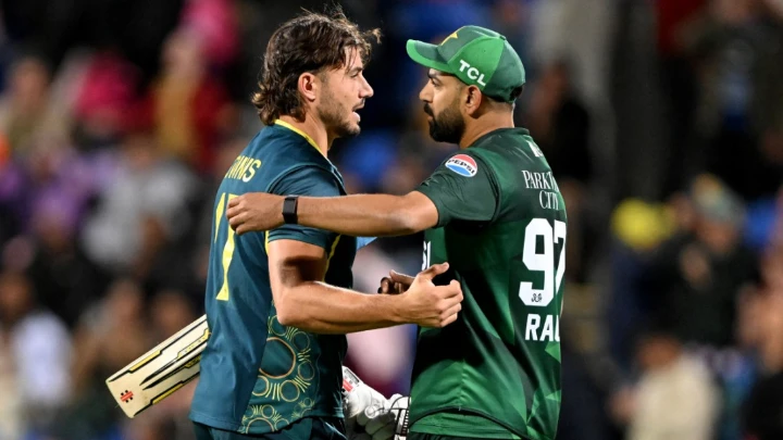 Australian batsman Marcus Stoinis (L) embraces Pakistan bowler Haris Rauf (R) after the third Twenty20 at the Bellerive Oval in Hobart on November 18, 2024. Photo: AFP