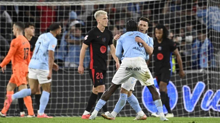 Celta Vigo's players celebrate their team's second goal during the Spanish league football match between RC Celta de Vigo and FC Barcelona at the Balaidos stadium in Vigo on November 23, 2024. | AFP photo.