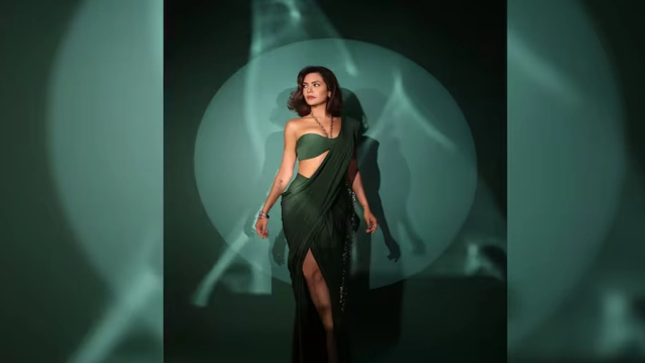 Esha Gupta looked saree-torially chic wearing a stunning drape in emerald hues