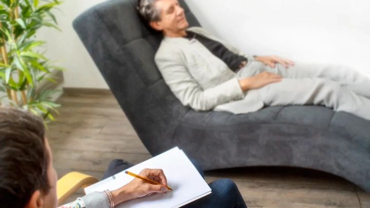 Despite many misconceptions, therapy can help patients experience greater contentment with their lives, psychotherapist Lori Gottlieb said. Frédéric Michel/iStockphoto/Getty Images