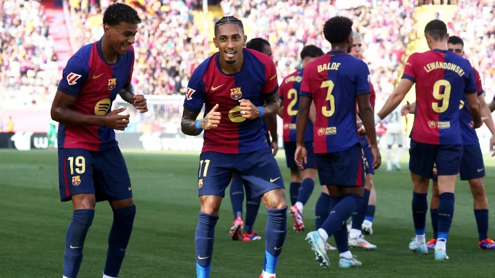 Barcelona's Raphinha celebrates with Lamine Yamal after scoring their first goal against Real Valladolid in La Liga match at the Estadi Olimpic Lluis Companys on August 31, 2024. PHOTO: REUTERS