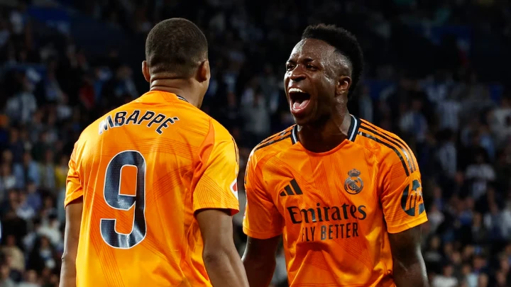  Soccer Football - LaLiga - Real Sociedad v Real Madrid - Reale Arena, San Sebastian, Spain - September 14, 2024 Real Madrid's Kylian Mbappe celebrates scoring their second goal with Vinicius Junior REUTERS/Vincent West