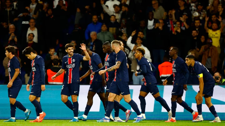 Soccer Football - Ligue 1 - Paris St Germain v Brest - Parc des Princes, Paris, France - September 14, 2024 Paris St Germain's Ousmane Dembele celebrates scoring their third goal with teammates REUTERS/Abdul Saboor 