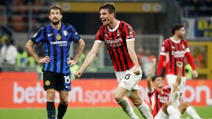 AC Milan's Matteo Gabbia celebrates after the match against Inter Milan. PHOTO: REUTERS