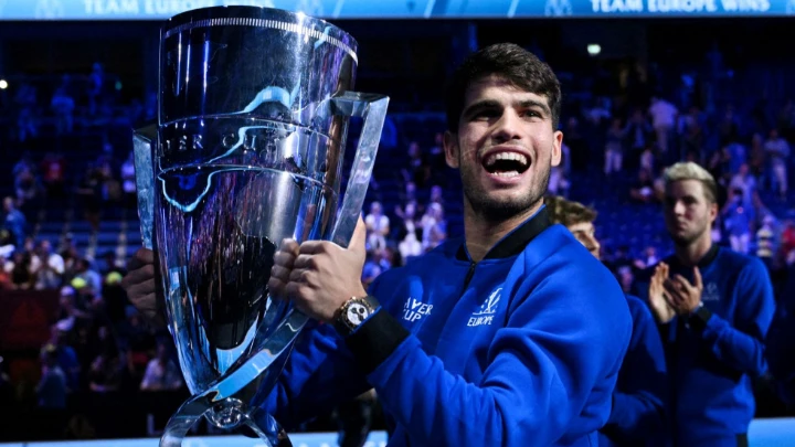 Team Europe's Carlos Alcaraz celebrates with the trophy after winning the Laver Cup. PHOTO: REUTERS