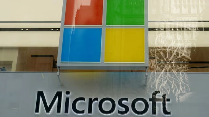 A Microsoft logo is pictured on a store in the Manhattan borough of New York City, New York, U.S., January 25, 2021. REUTERS/Carlo Allegri/File Photo