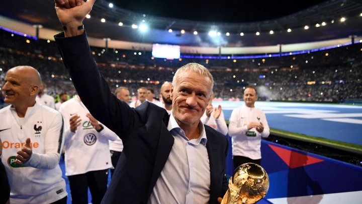 France's coach Didier Deschamps celebrates as they do a lap of honour during a ceremony to celebrate the victory of the 2018 World Cup at the end of the UEFA Nations League football match between France and Netherlands at the Stade de France stadium, in Saint-Denis, northern of Paris, on September 9, 2018. PHOTO: AFP