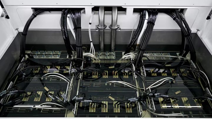 A view shows immersed chips in a Sustainable Metal Cloud (SMC) HyperCube at the company's Sustainable AI Factory in Singapore July 25, 2024. REUTERS/Caroline Chia/File Photo