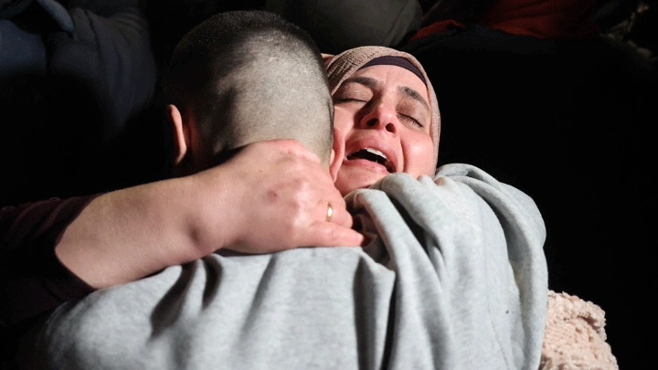 Late night tears and hugs for released Palestinian prisoners