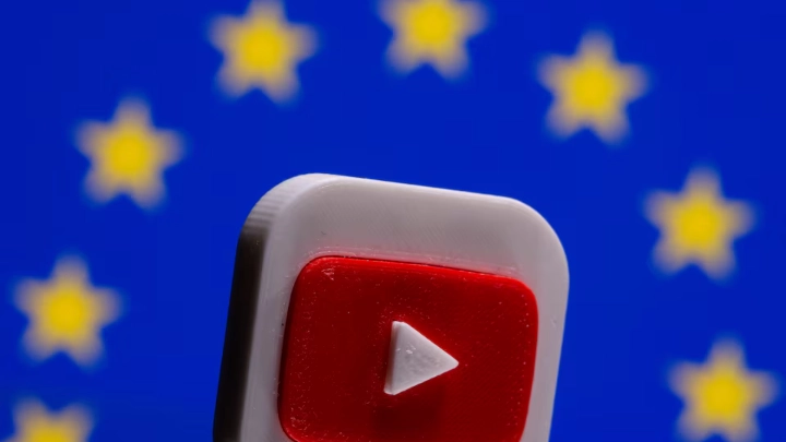 A 3D printed Youtube logo is seen in front of a displayed EU flag in this illustration picture taken on June 21, 2021. REUTERS/Dado Ruvic/Illustration/File Photo