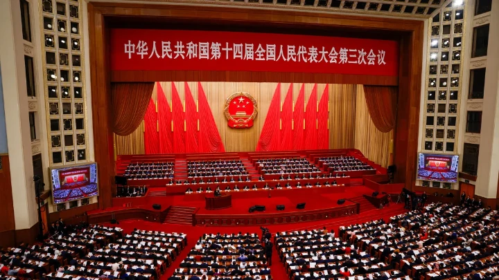 Chinese Premier Li Qiang delivers a speech during the opening session of the National People's Congress at the Great Hall of the People in Beijing on March 5, 2025. Tingshu Wang/Reuters