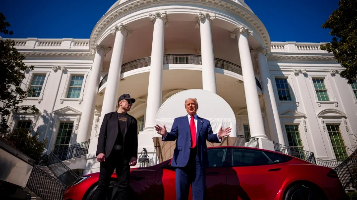 President Donald Trump and Elon Musk speak next to a Tesla Model S on the South Lawn of the White House on March 11, 2025, in Washington, DC. Andrew Harnik/Getty Images